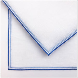 Twinline custom embroidered color edge linen napkins.