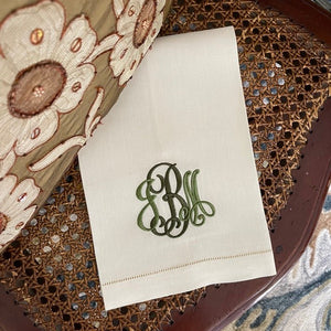 Kate embroidered custom monogram on ecru linen guest towel.